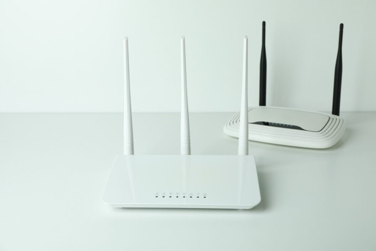 Wi-Fi routers with external antennas on white background